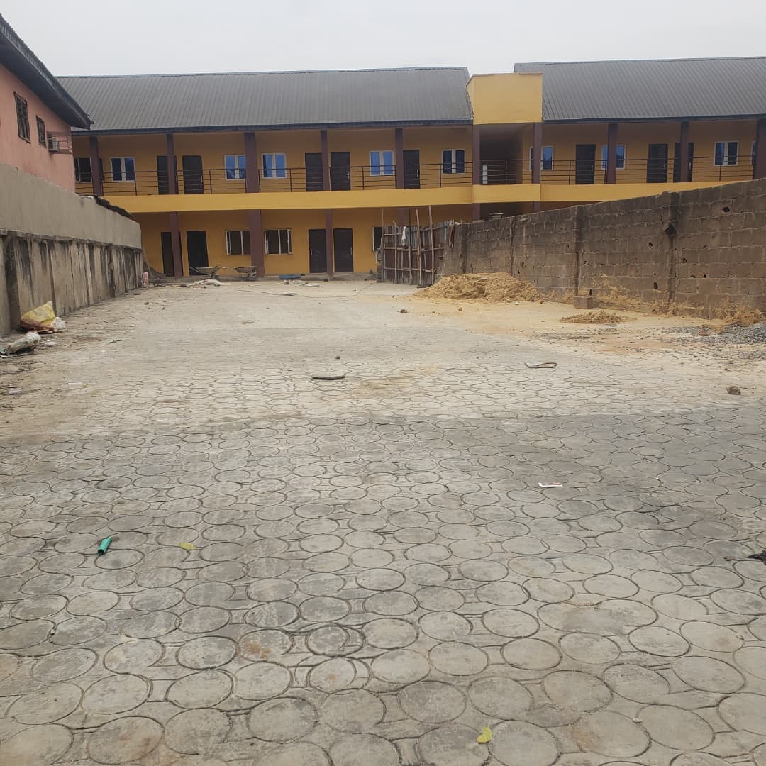 Completion of the flooring and fencing of the agege local government complex building (annex).